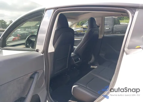 2023 Tesla Model Y Awd/Long Range Dual Motor All-Wheel Drive из США, поврежденный, VIN 7SAYGDEE6PF620991